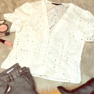 Die cut embroidered Zara blouse.